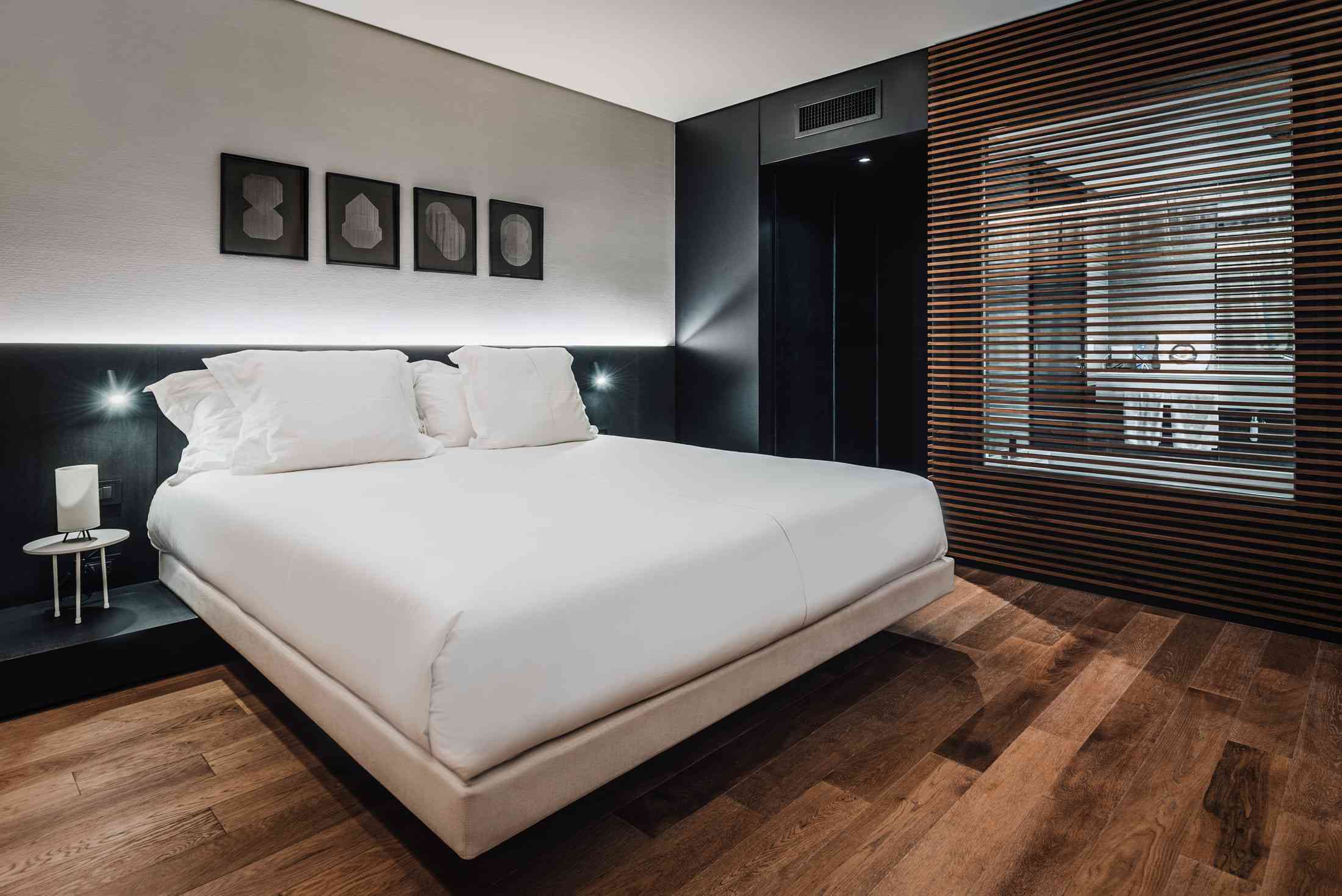bedroom with view of bathroom