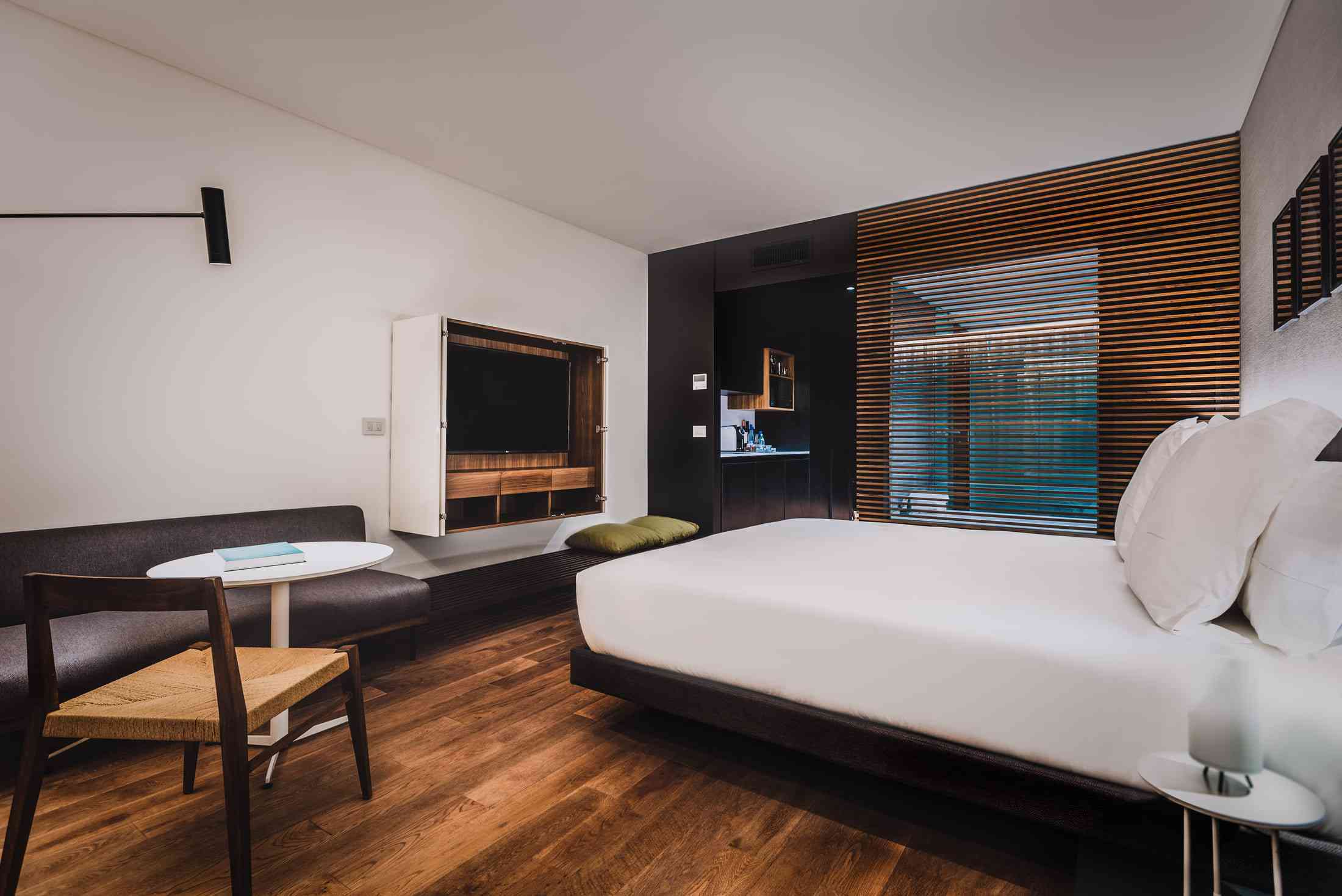 bedroom with view of bathroom
