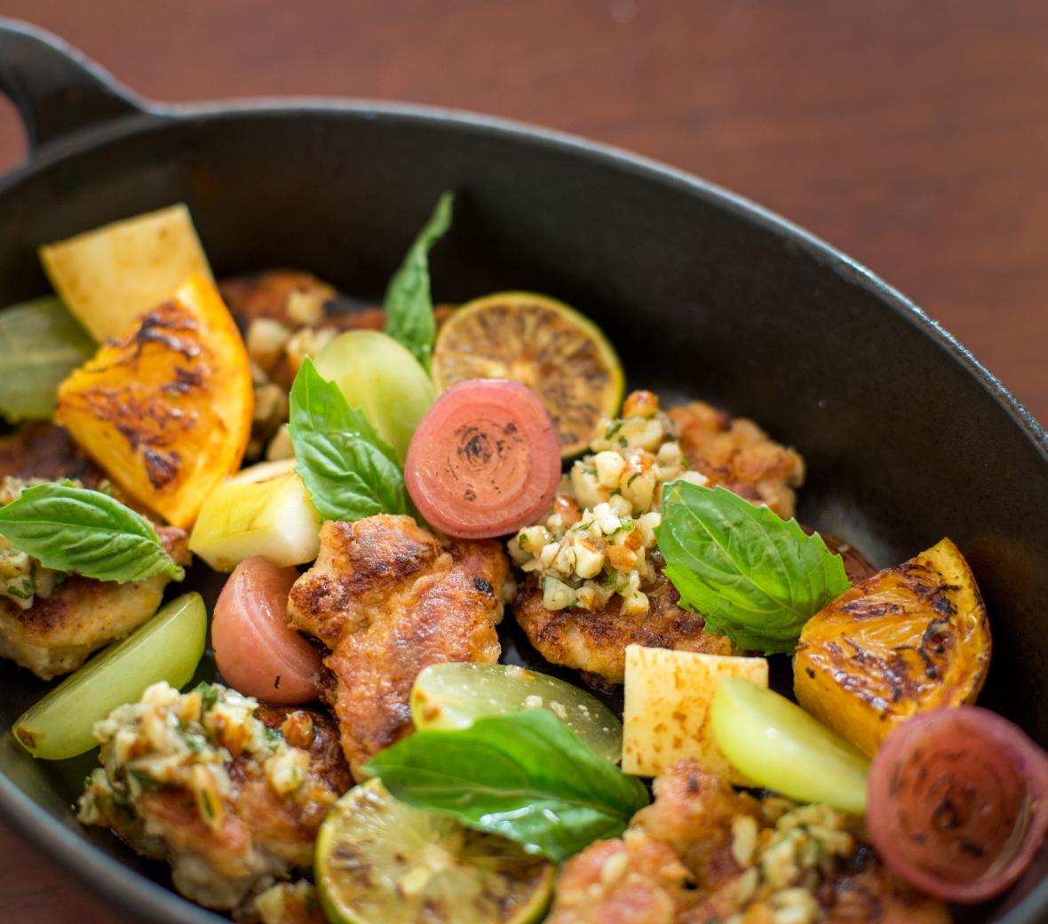Dish of sweetbreads with vegetable garnishes