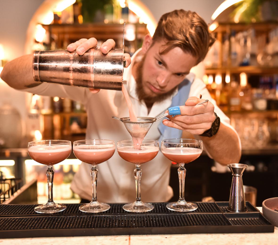 a bartender making drinks