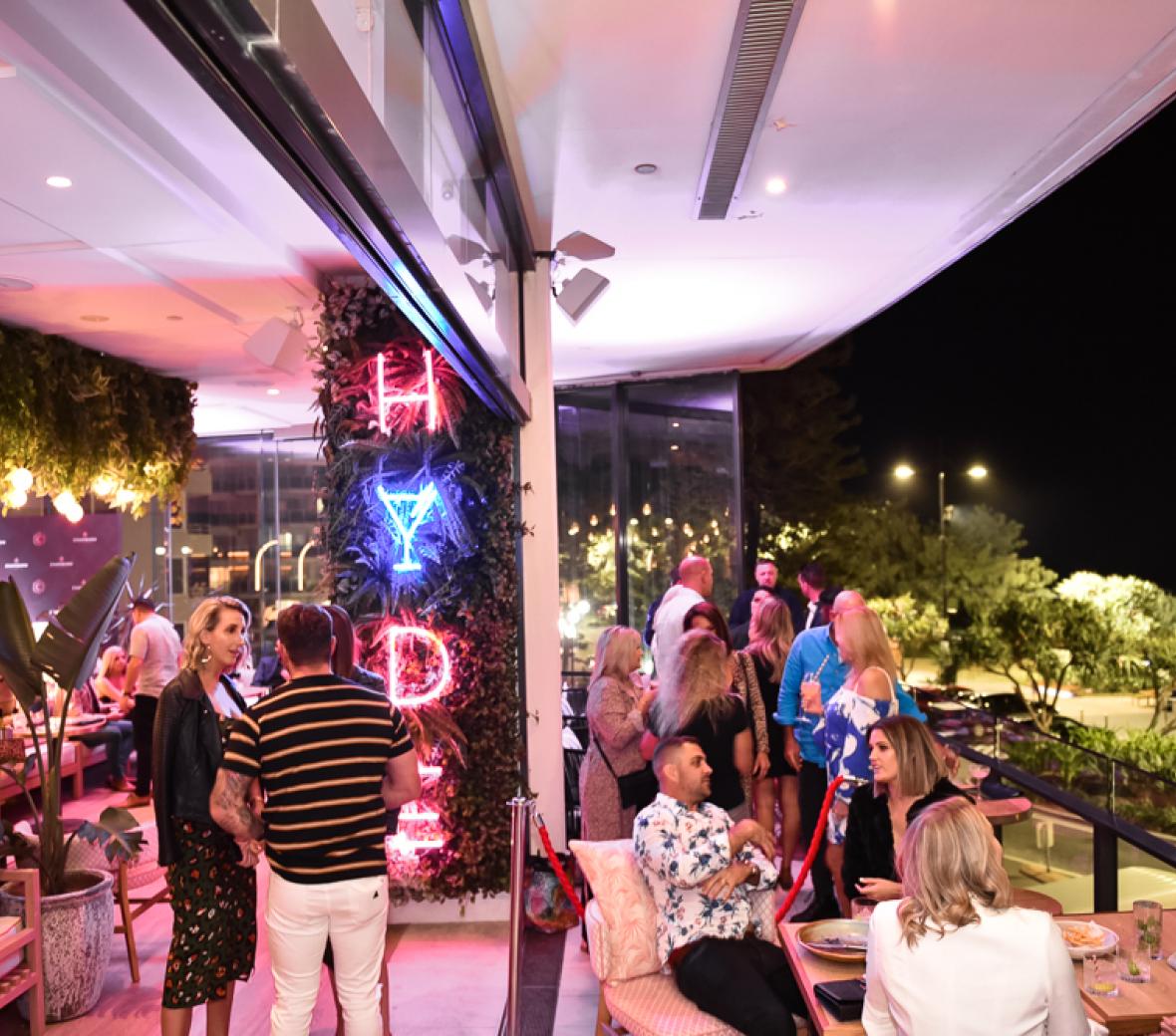 people socializing on the patio