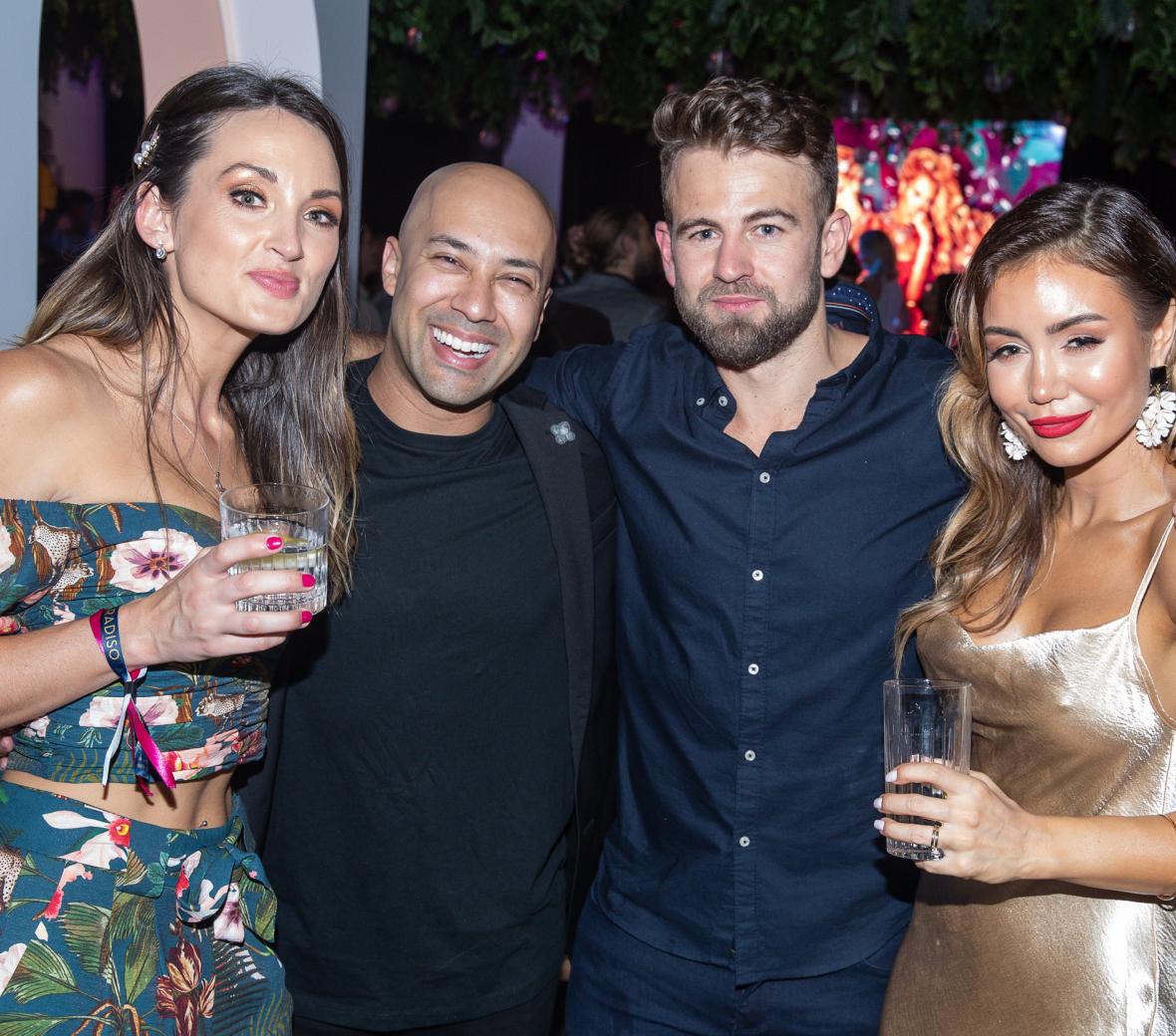 posing for a photo with friends