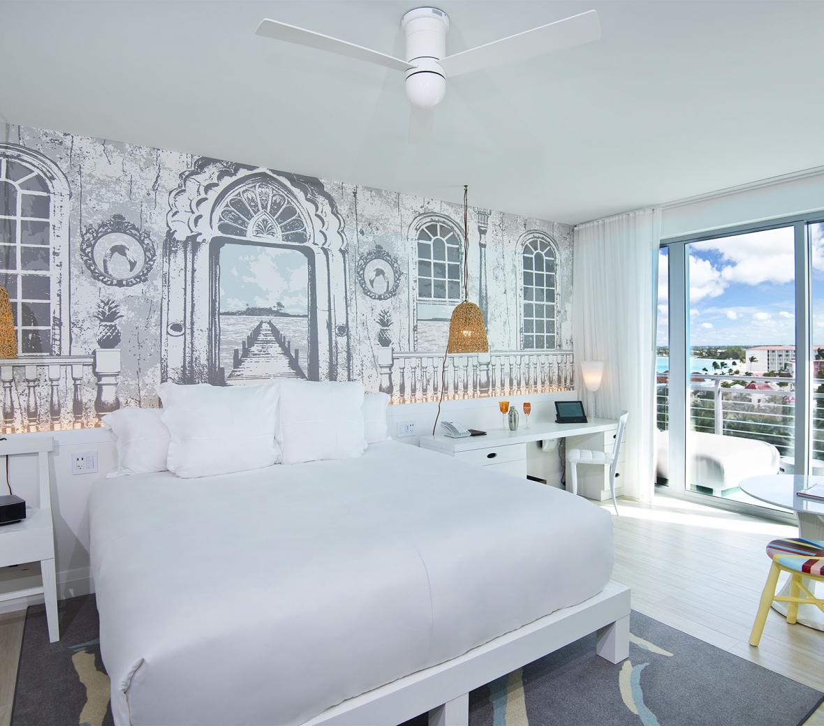 ocean view hotel room with king bed