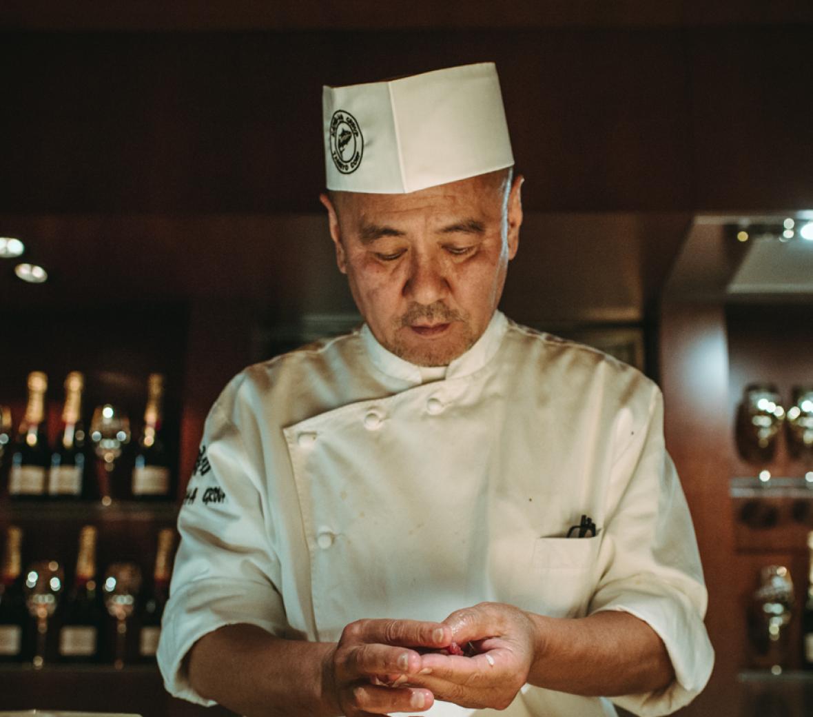 Chef Katsuya in his kitchen preparing a dinner service