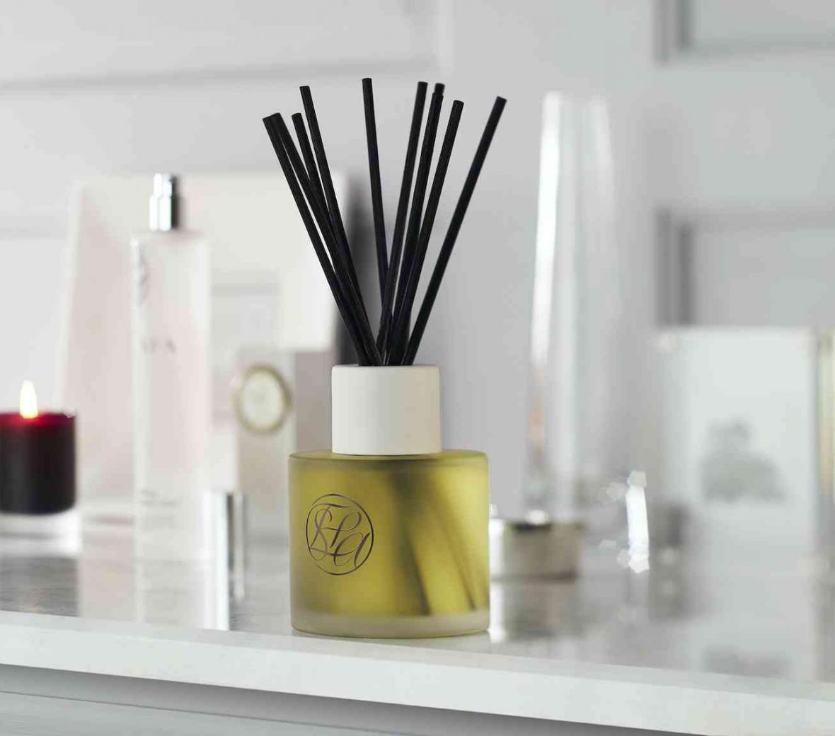 fragrance bottles on white counter