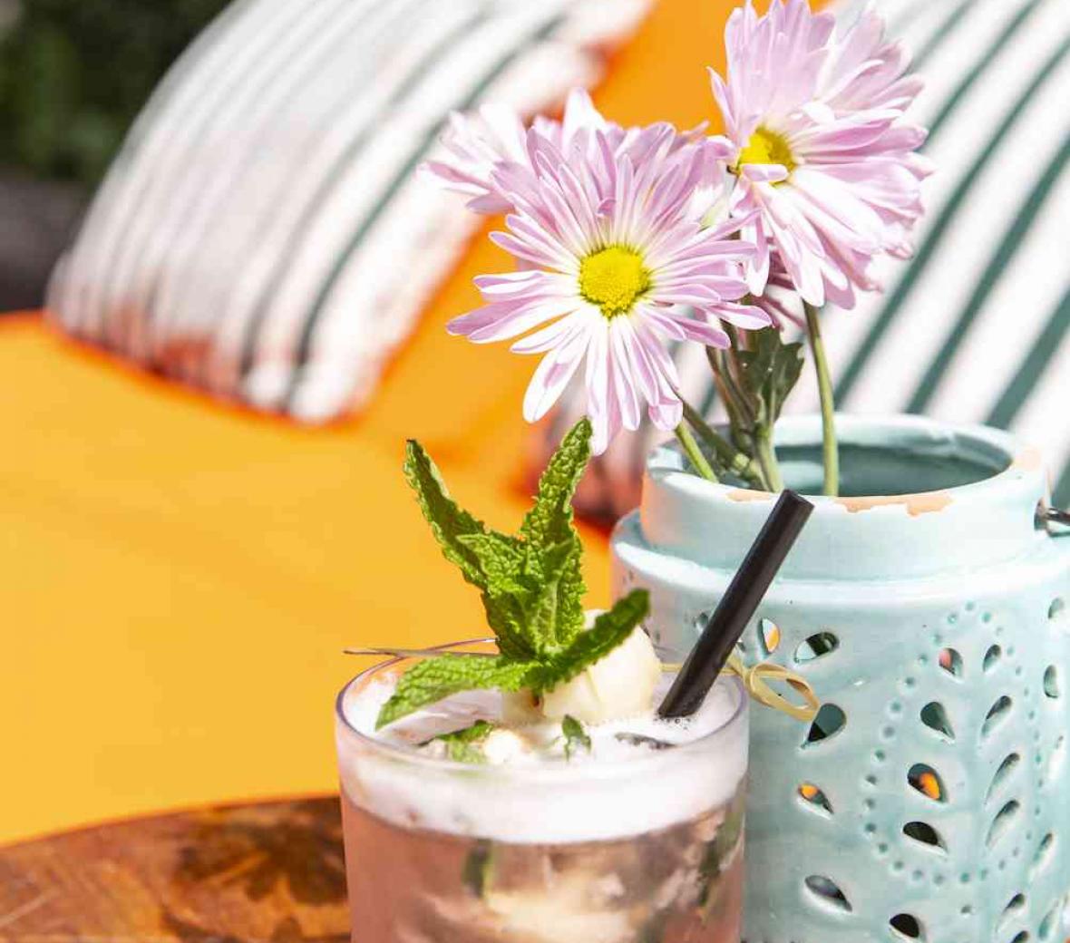 cocktail by pool chairs