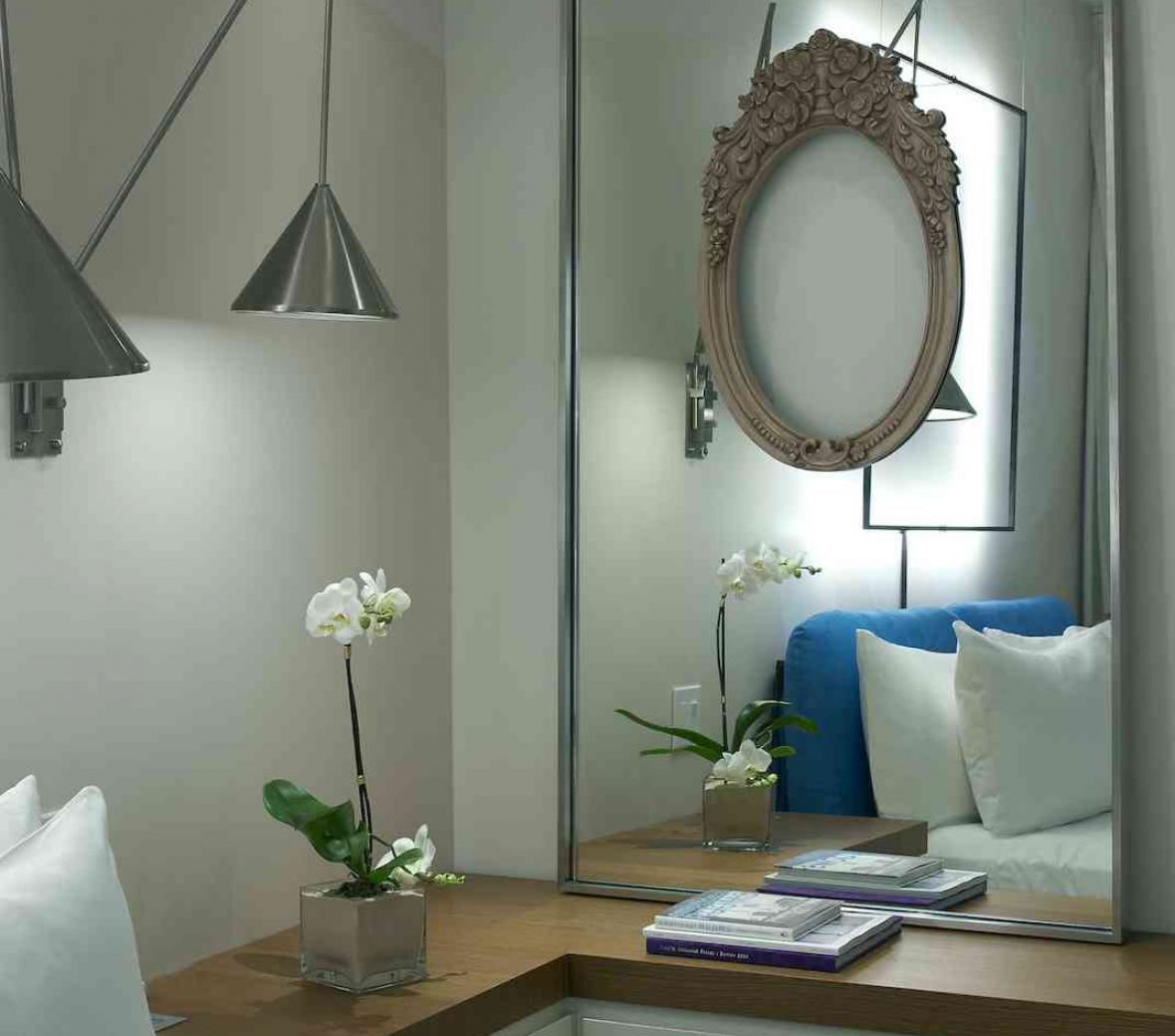 bedside counter space and mirror