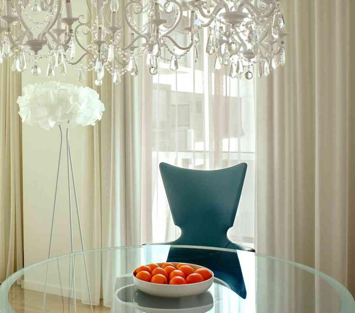 glass dining table and chandelier