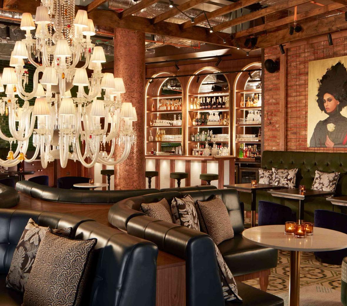 a lounge with a large chandelier