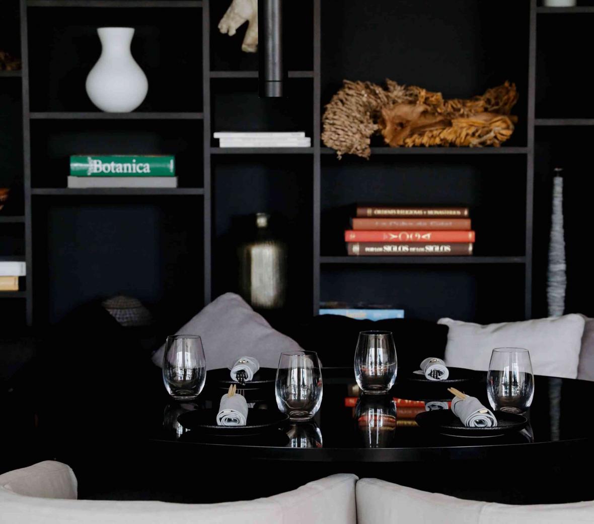 Shelving unit with books and vases