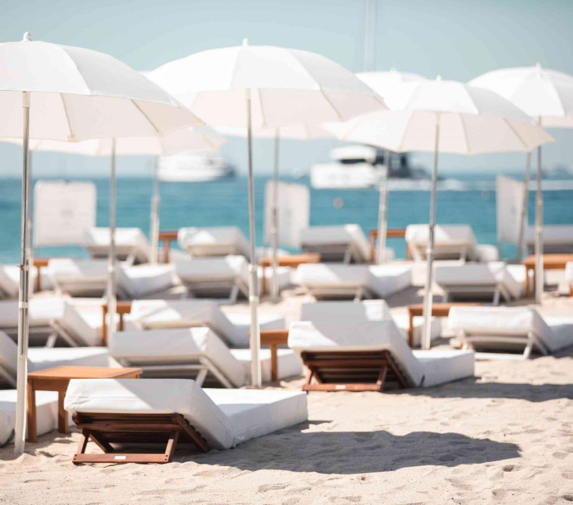 Beach chairs lined up at Hyde Beach Cannes