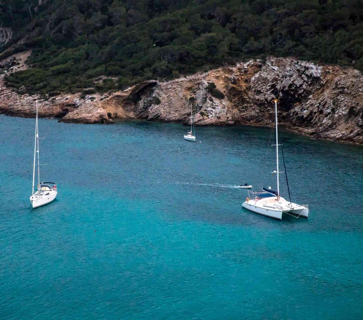 Saiboats in the ocean off the coast of Ibiza