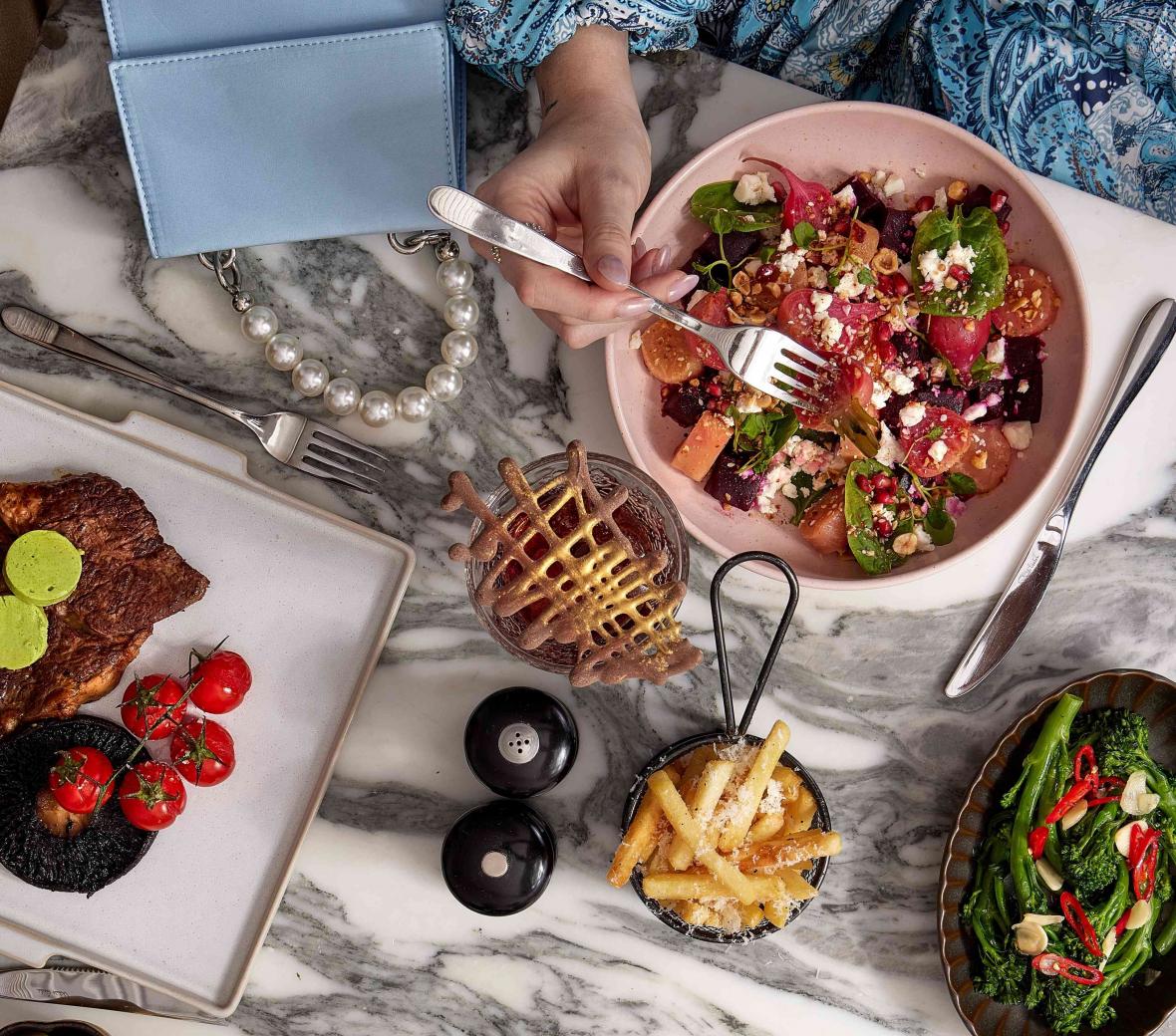 Salad Steak and Cocktails on Table