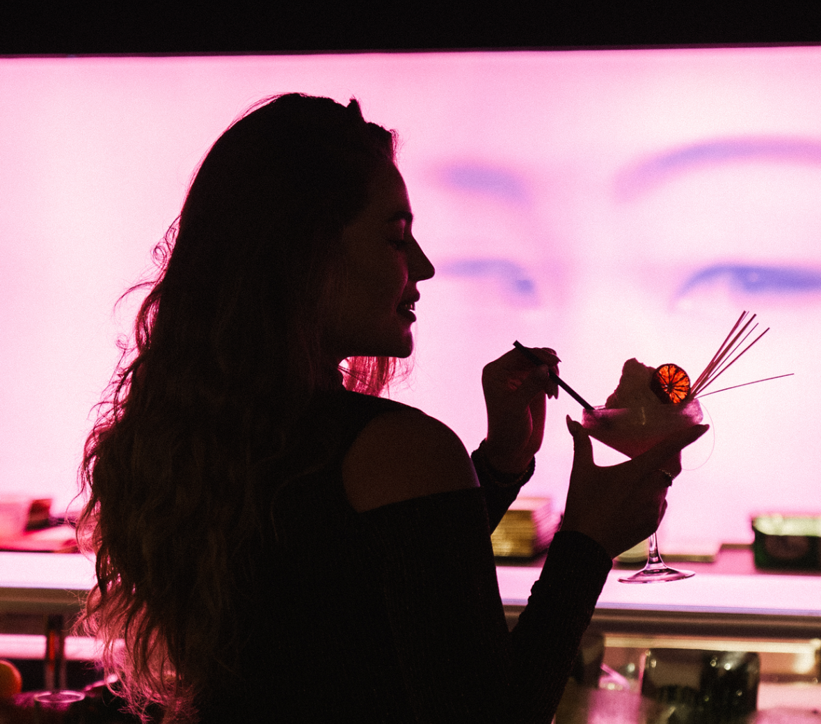 Lady enjoying a signature cocktail at Katsuya Dubai ladies night.