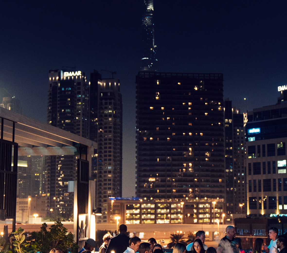 Katsuya Dubai terrace with people enjoying cocktails and Burj Khalifa view