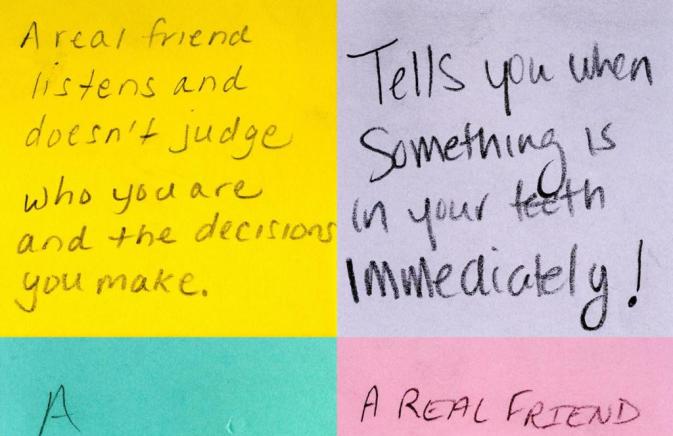 series of colorful sticky notes with hand writing
