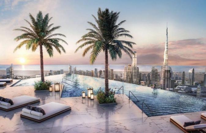 infinity pool looking over Dubai skyline