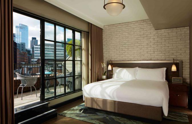 hotel room with a patio overlooking shoreditch