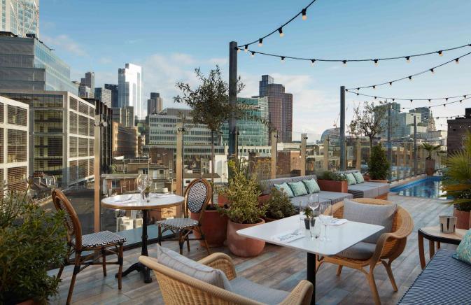 rooftop pool and dining area in shoreditch