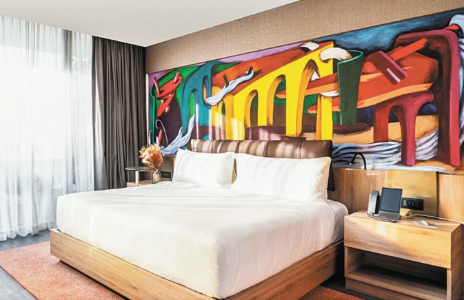 queen bed in room at Mondrian Mexico City Condesa