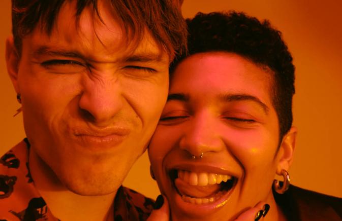 two people making funny faces for the camera