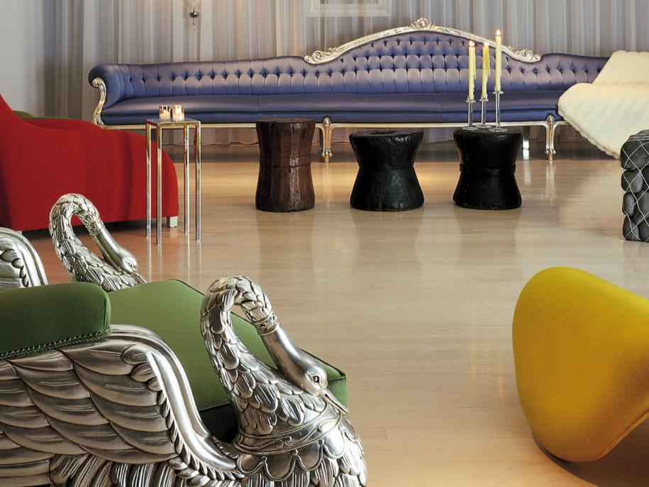 Sanderson lounge area with red, yellow and green chairs