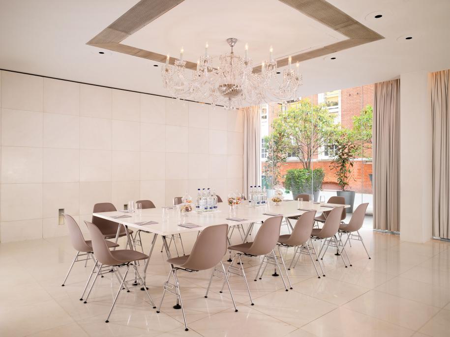 meeting room with large window and boardroom table