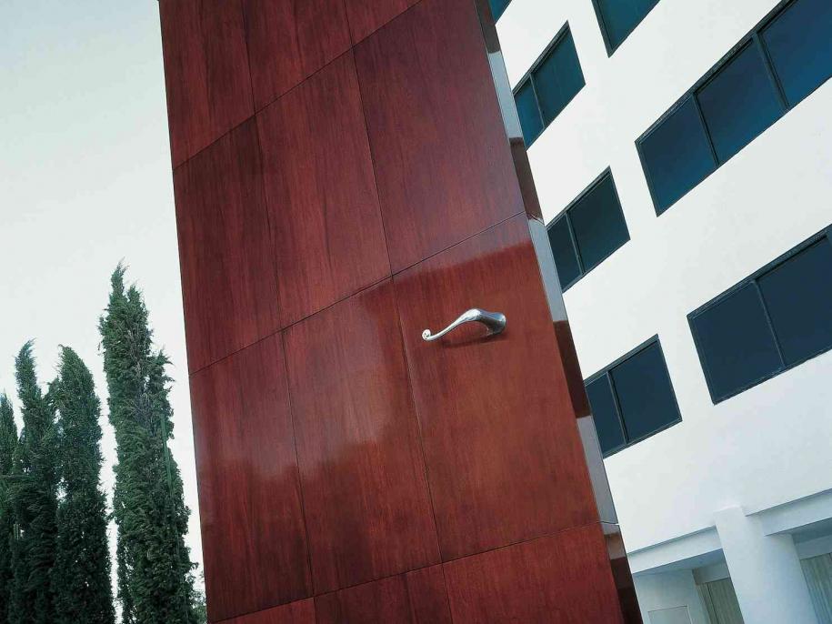 an oversized door outside of a hotel