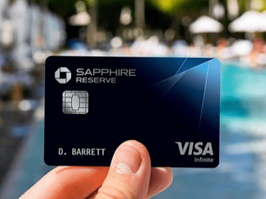 someone holding up a Chase Sapphire card