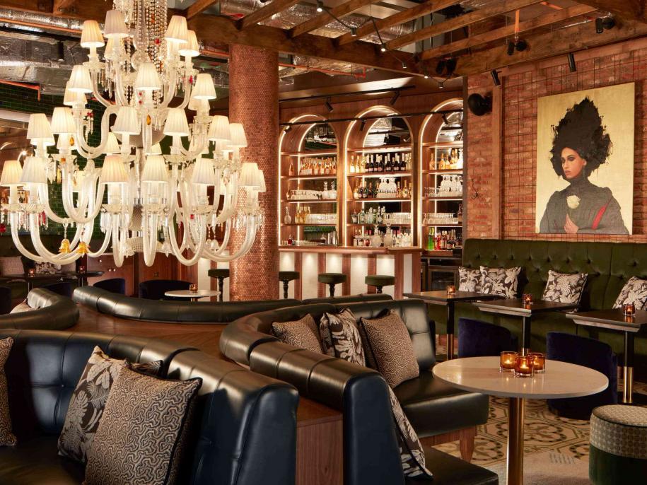 a lounge with a large chandelier