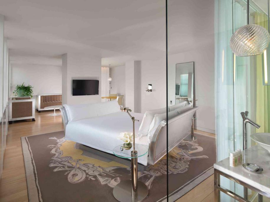 view of bedroom from bathroom