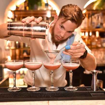 a bartender making drinks