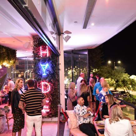 people socializing on the patio