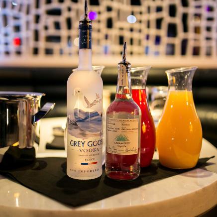 Grey Goose and other liquors on a table