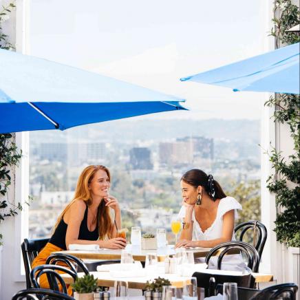 two women on a patio