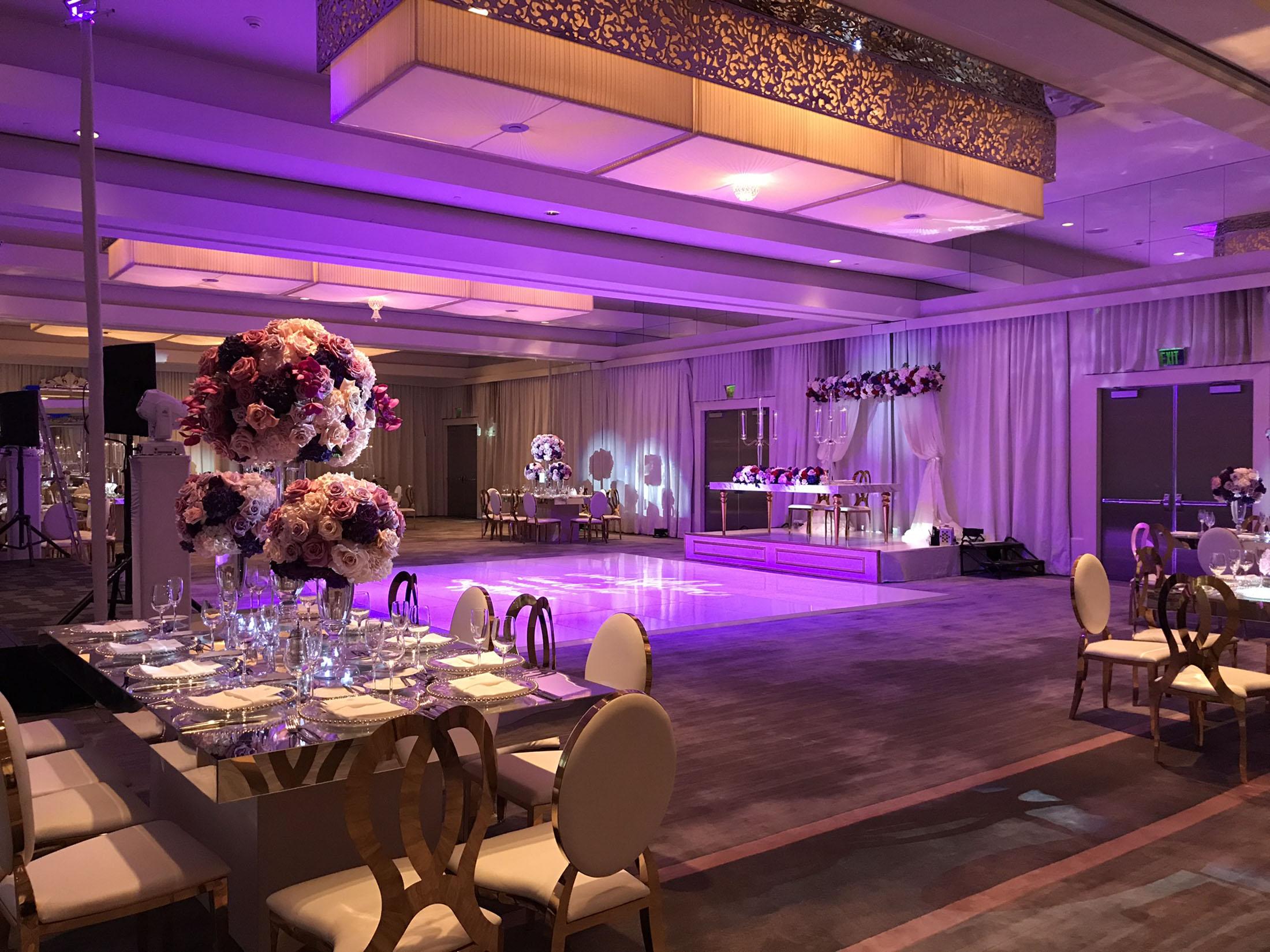 a ballroom lit with purple