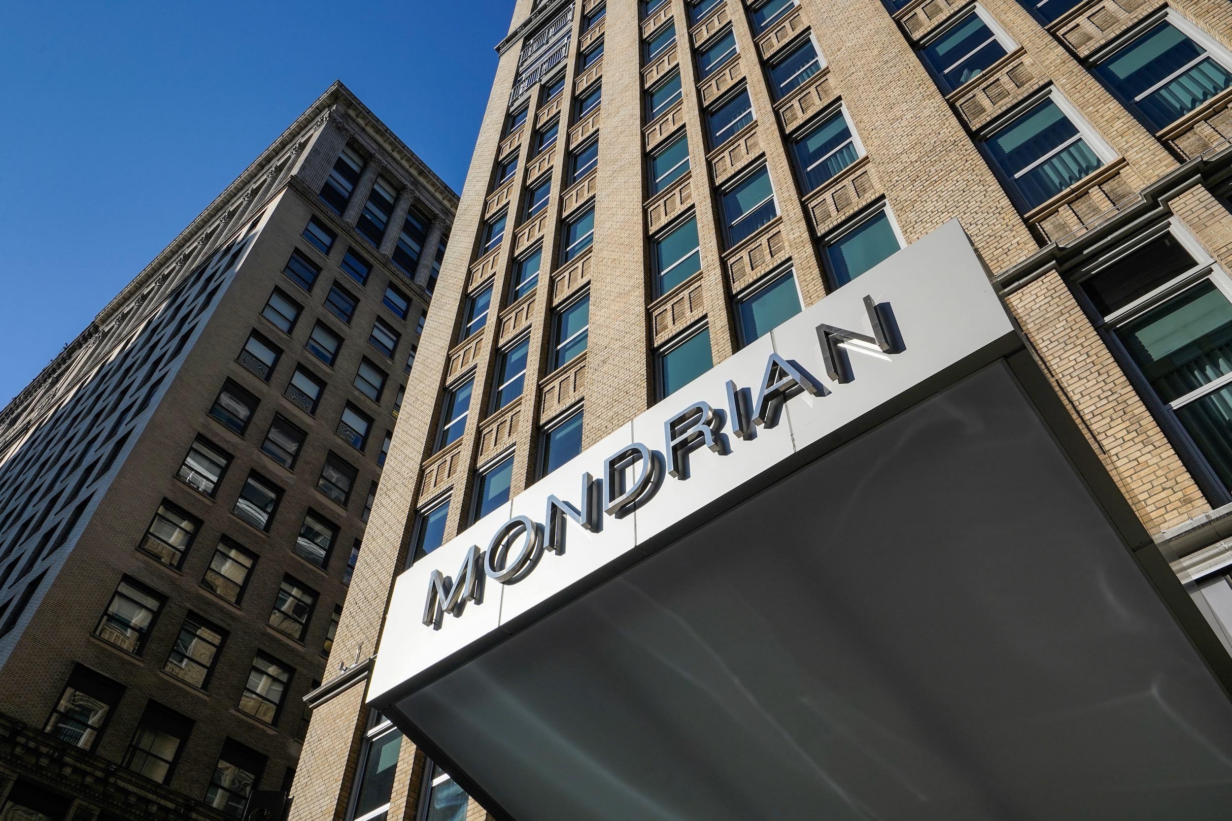 outside of Mondrian Park Avenue hotel building and sign