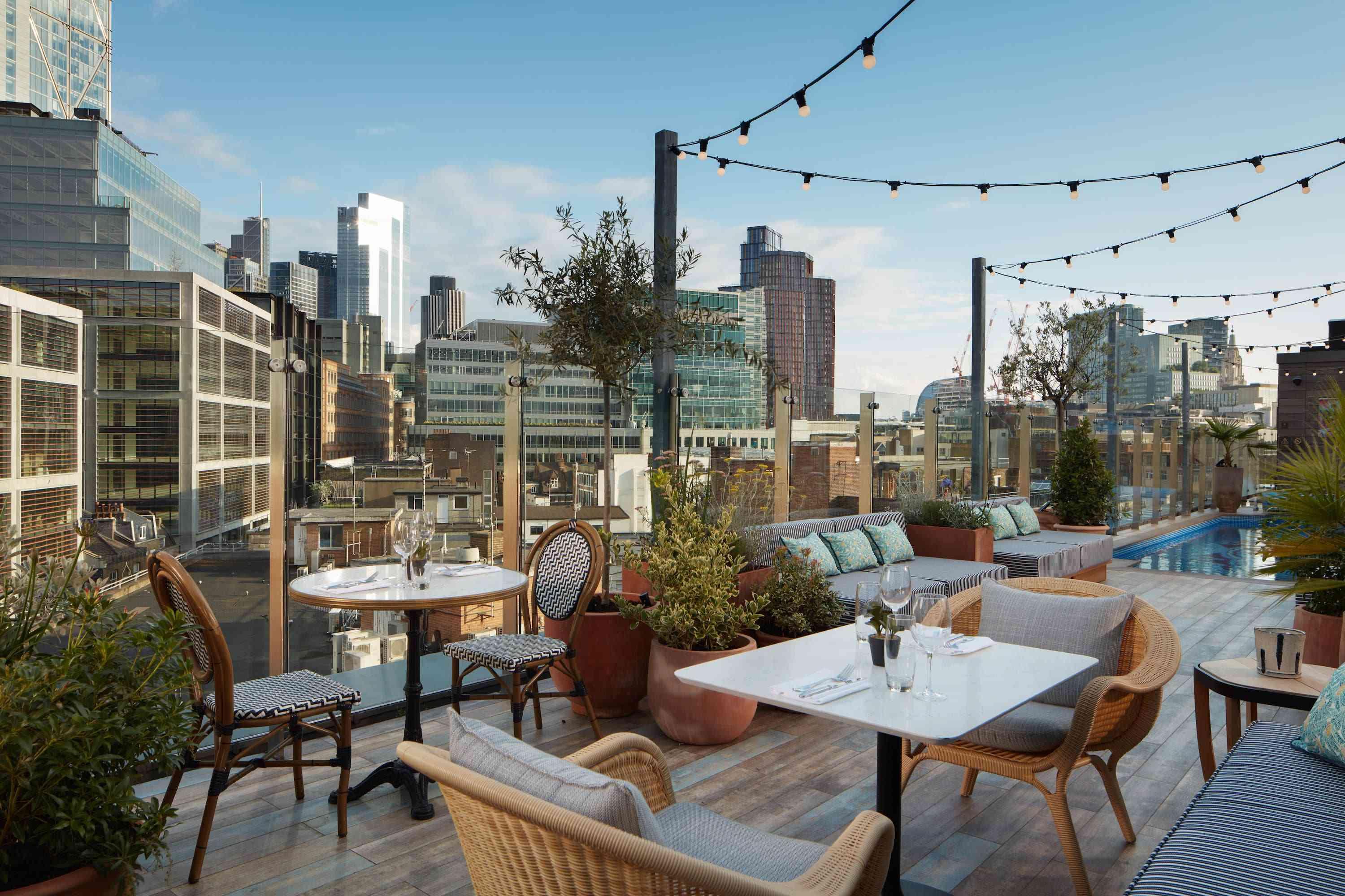 rooftop pool and dining area in shoreditch