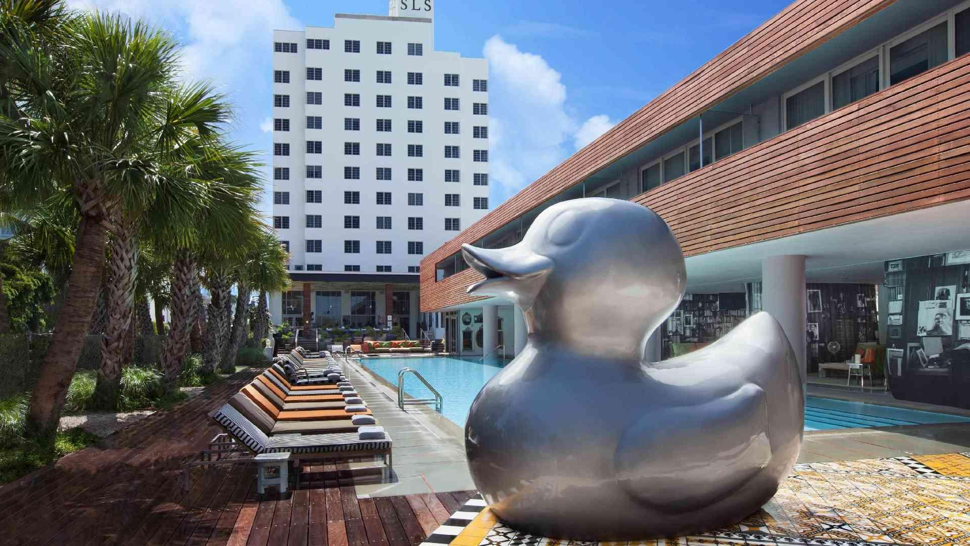 the pool with a large duck statue