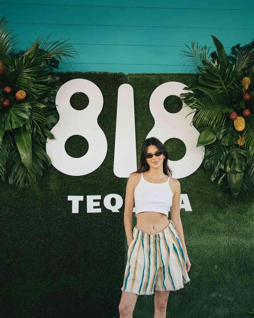 Kendall Jenner in SLS Baha Mar standing in front of her 818 Tequila Sign 