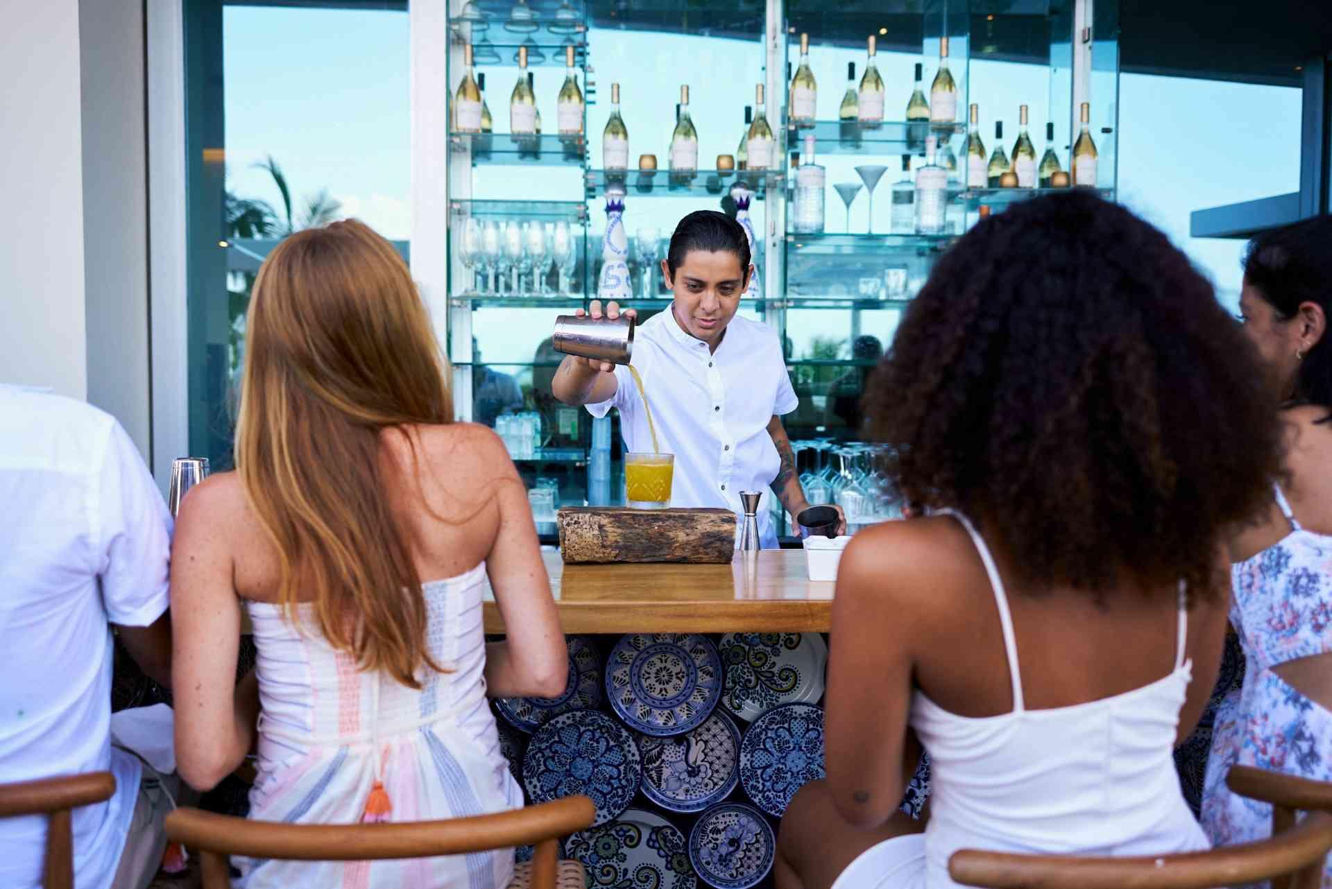 bartender serving beverages