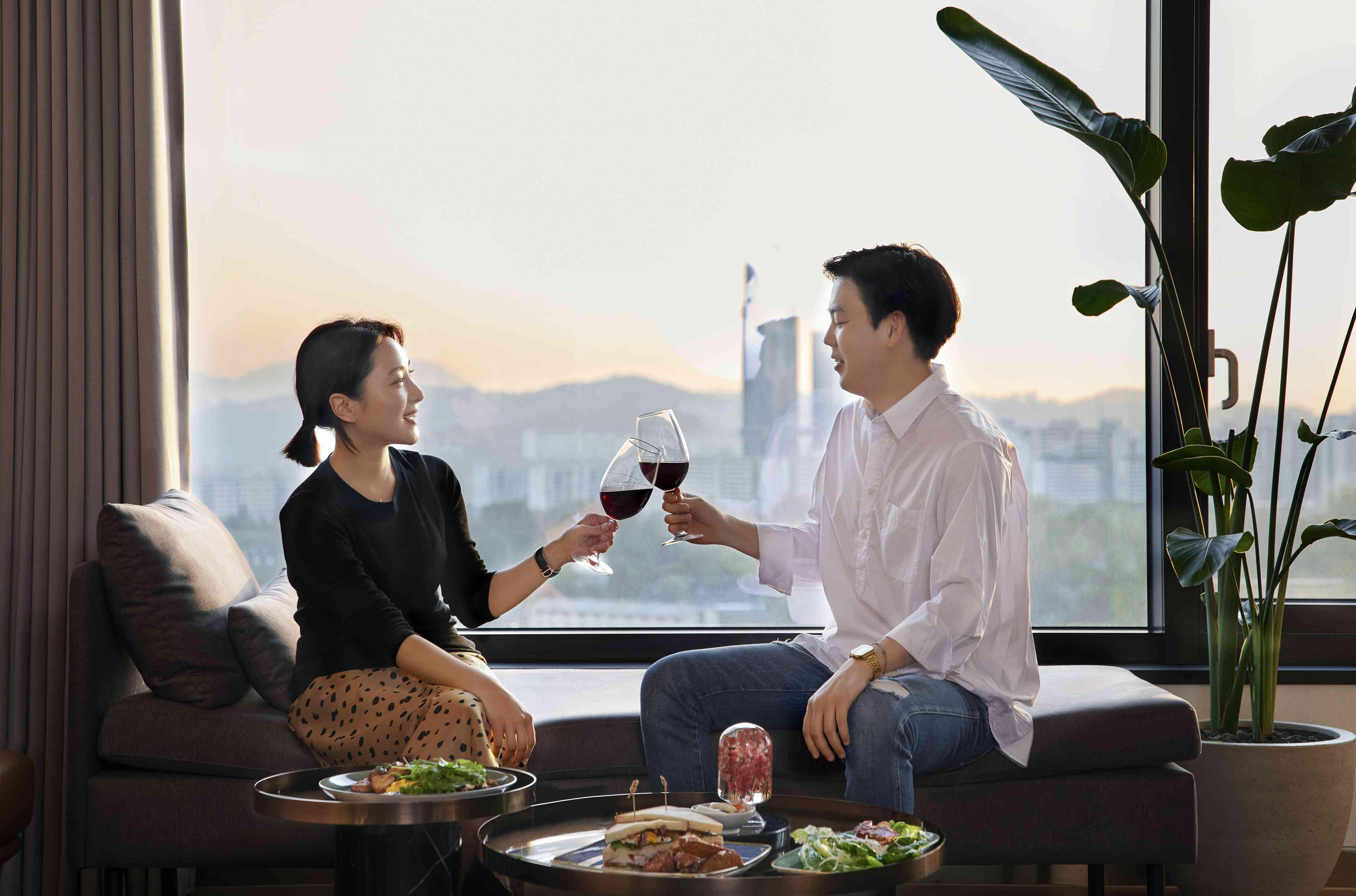 Couple enjoying view with dinner and drinks 