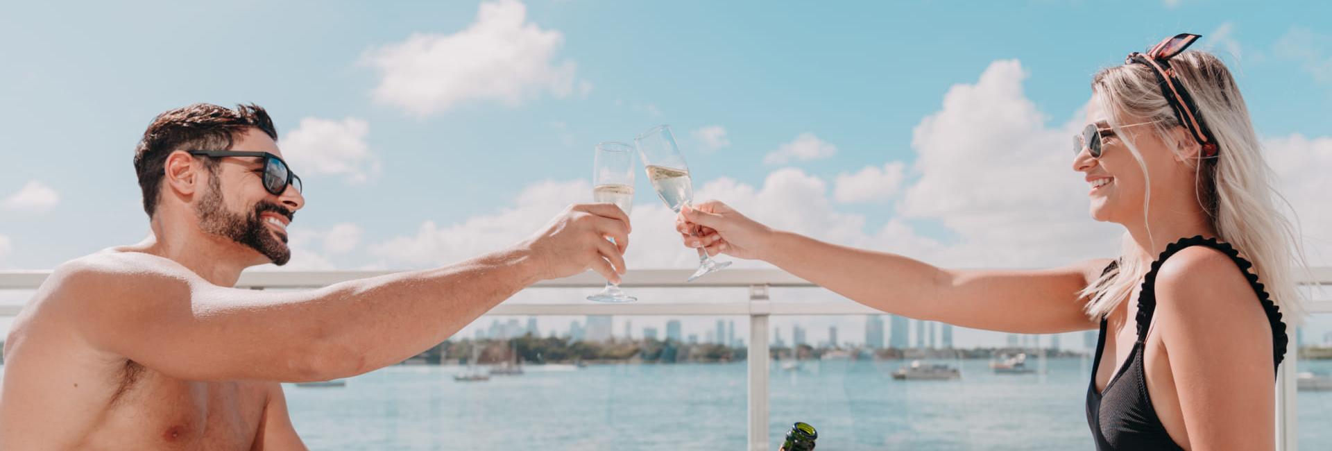 A couple drinking champaign on a balcony