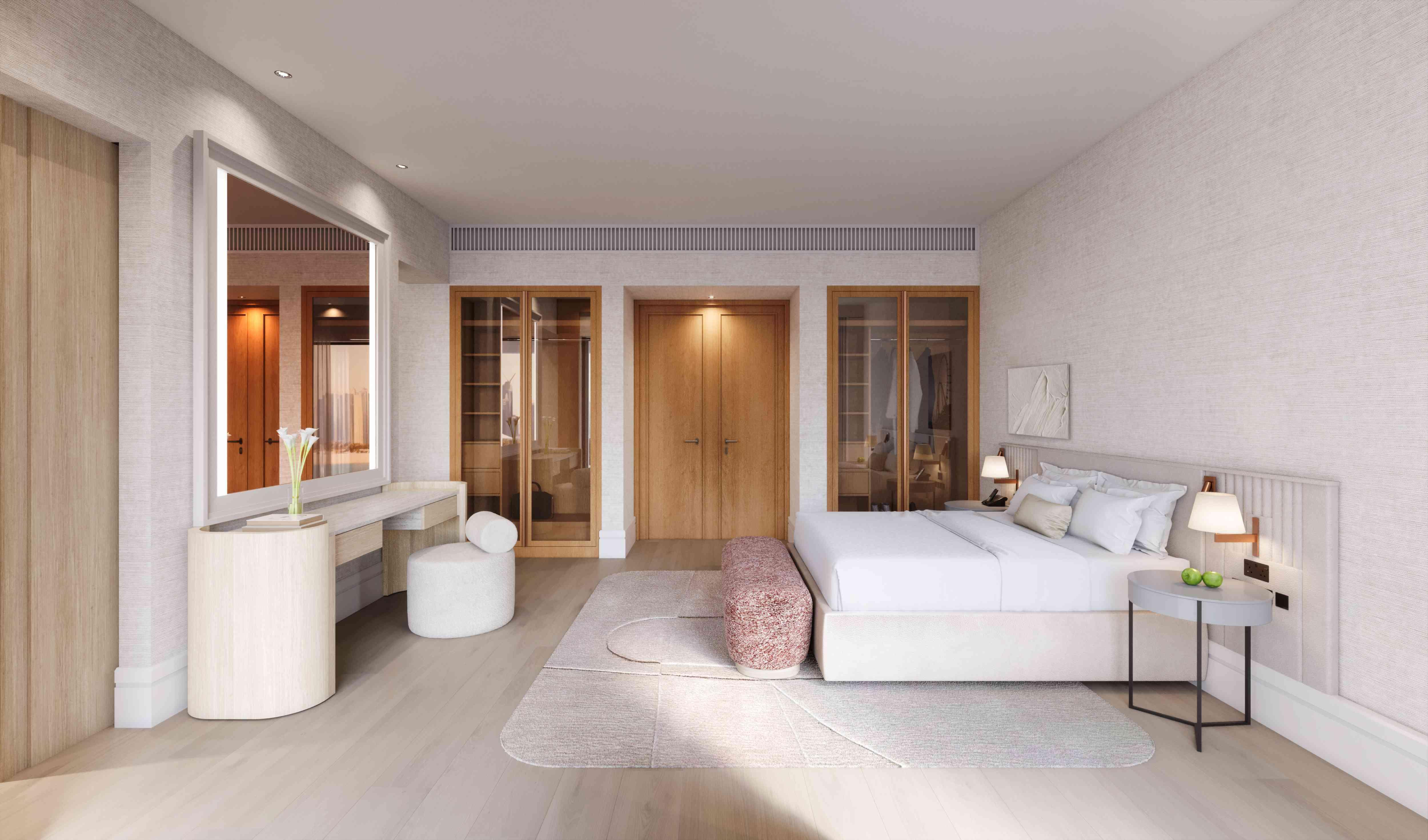 king bed and vanity in suite
