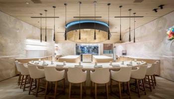 white chairs surrounding a white table