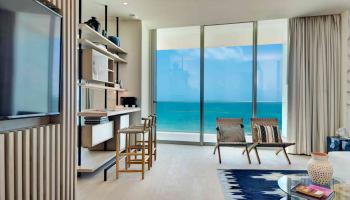 two chairs with ocean view background