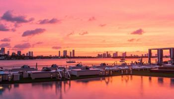 Beach club with sunset behind it
