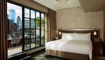 hotel room with a patio overlooking shoreditch