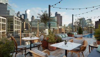 rooftop pool and dining area in shoreditch