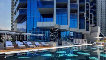 Hyde Hotel Dubai outdoor pool and chairs
